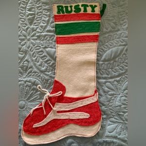 Vintage (70’s) Home crafted Christmas Stocking with name “Rusty” on it.